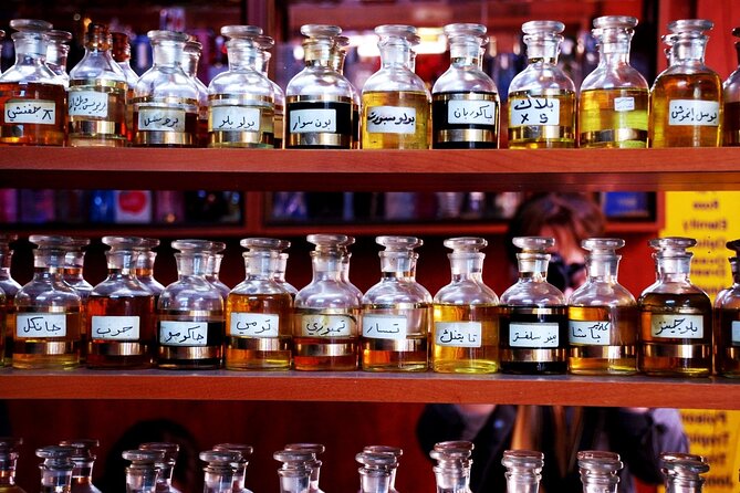 Royal Vision Walking around Old Dubai Tour with Abra, English Guide - Hami Perfumes on Sikkat Al Khali: learn what oud and oils mean