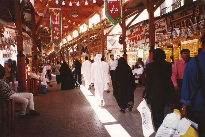 Royal Vision Walking around Old Dubai Tour with Abra, English Guide - Deira Old Souk marine transport station: ticket office stop that keeps you oriented
