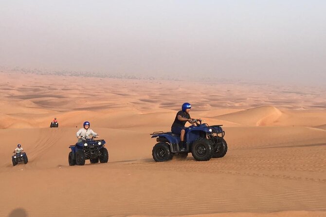 Self Drive Quad Bike in Open Desert With Sand Boarding and Camels - Sandboarding in the Dunes: The Fun After the Rush