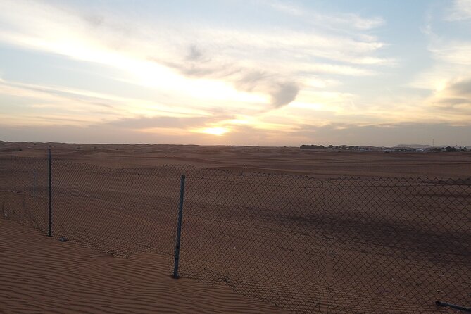 Shared Desert Safari Tour Dubai with Dinner Included - Sunset stop on the high dune: when photos get easier