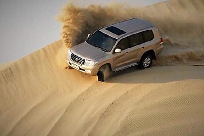 Sunset Desert Safari Dubai with BBQ Dinner & Live Shows - Getting to the desert: hotel pickup that actually matters