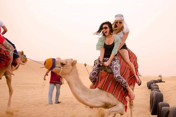 Sunset Desert Safari Dubai - Dune bashing, sandboarding, and your sunset photo window