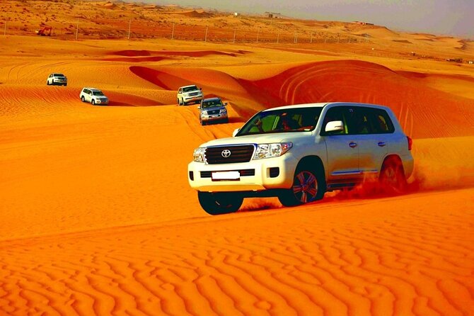 Sunset Desert Safari | Premium BBQ Dinner | Red Sand Dune - Henna, camel ride, shisha, and the dressed-for-photos touch