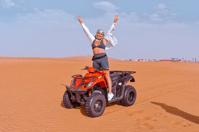 Sunset Desert Safari Quad bike Camel ride Sand Board & BBQ Dinner - Lahbab Stop: Quad Bike Time for 30 Minutes