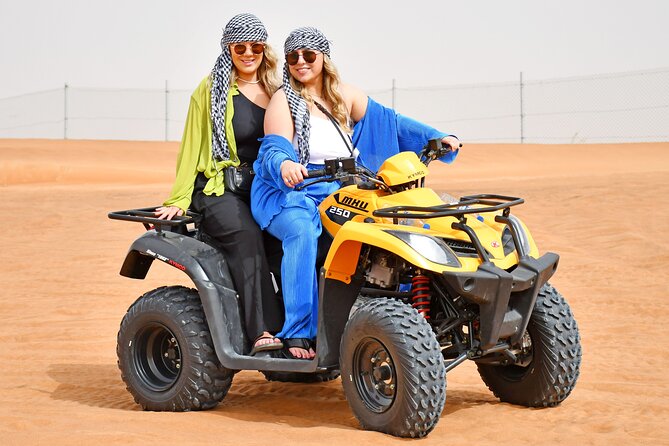 Sunset Desert Safari Quad bike Camel ride Sand Board & BBQ Dinner - Dune Bashing, Sandboarding, and Sunset Photo Breaks