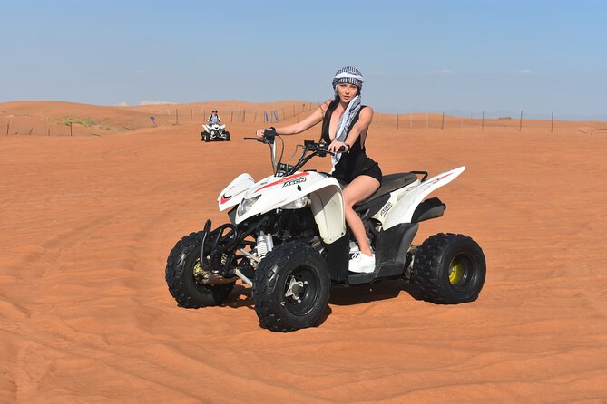 Sunset Desert Safari Quad bike Camel ride Sand Board & BBQ Dinner - Pickup From Dubai or Sharjah, Then Straight to Al Lahbab