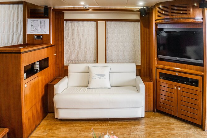 Sunset escape on Bluemoon 64ft from Dubai Marina to Atlantis - Optional Add-Ons: BBQ and Watersports, Including Jetski When Available