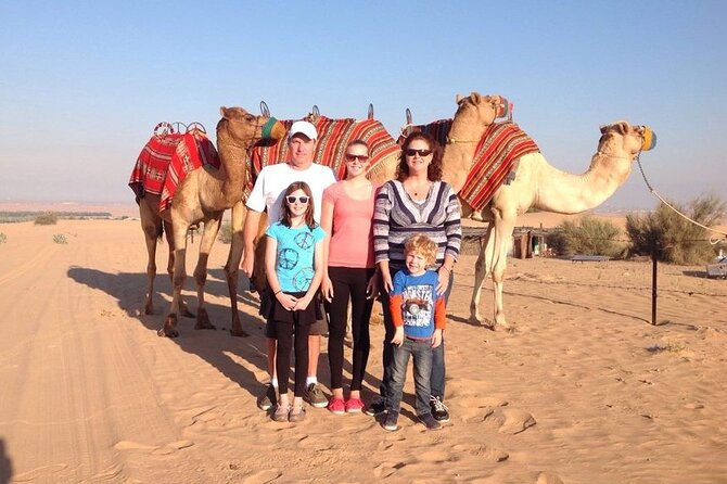 Thrilling Desert Safari Dubai Adventure with Sand Boarding and Barbecue Dinner - Live entertainment: belly dance, Tanura-style show, and fire