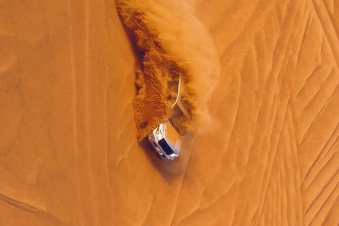 Thrilling dune bashing with VIP Desert camp delicious BBQ & shows - Belly Dance, Fire Dance, and the Evening Show Flow