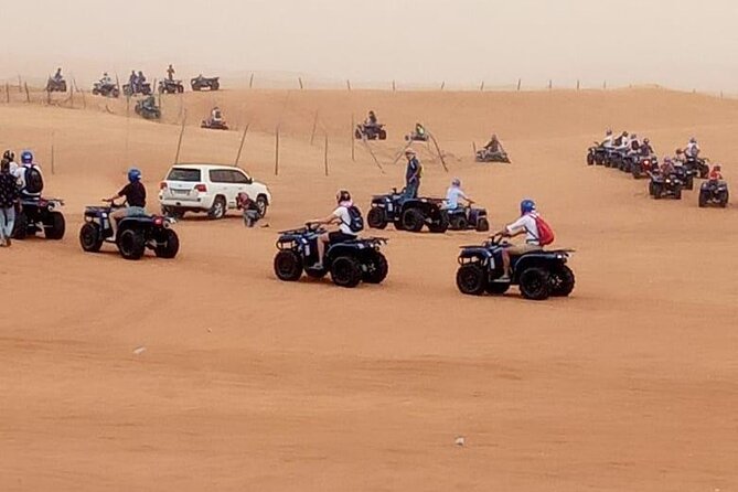 Ultimate Desert Experience Quad Bike, Sandboarding, Camel Ride - Bedouin camp welcome: coffee, dates, henna, shisha, and traditional sweets