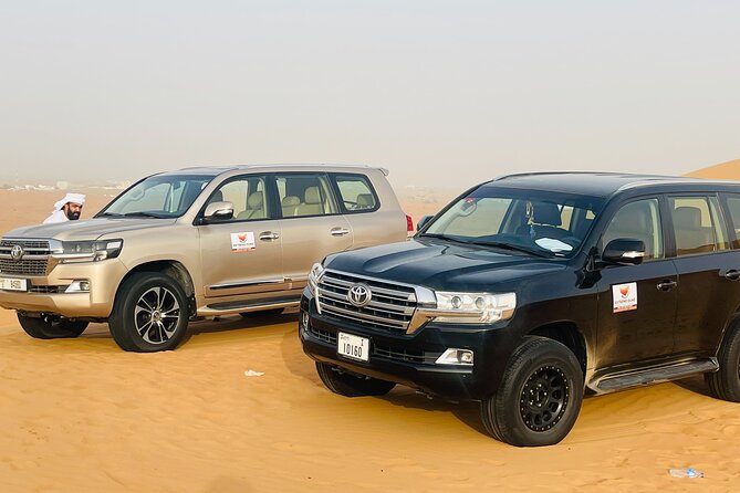 VIP Desert Safari with High Red Dune Bashing & Live BBQ Dinner - Desert Picture Stops, Sandboard Time, and Camel Ride