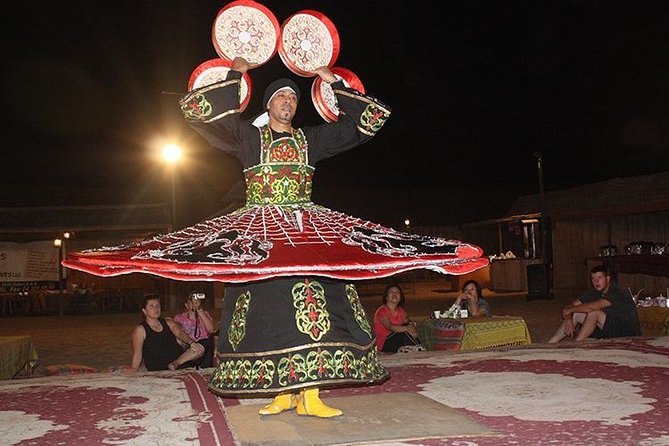 VIP Dubai Desert Safari with Dinner served at table and 3 live Shows - Table-served BBQ dinner under desert stars