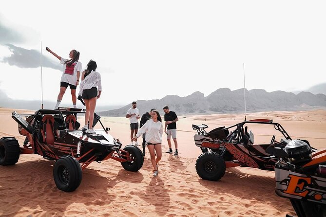 Vip Evening Desert Safari with quad bike,Camel Riding & Dinner - Stop 1 at Al Awir Camp: Camel Photos, Henna, and Five Shows