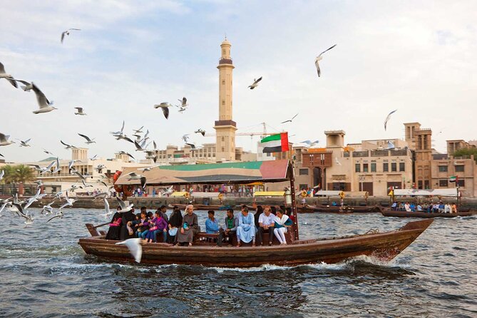Walk in Old Dubai with New Friend(Pickup option Availabl) - Starting at Sharaf DG Metro, Then Warming Up in Al Fahidi